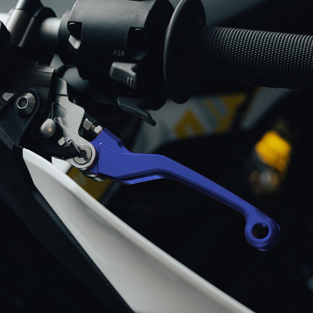 Blue adjustable brake levers for Sur-Ron Ultra Bee, fitted to a handlebar