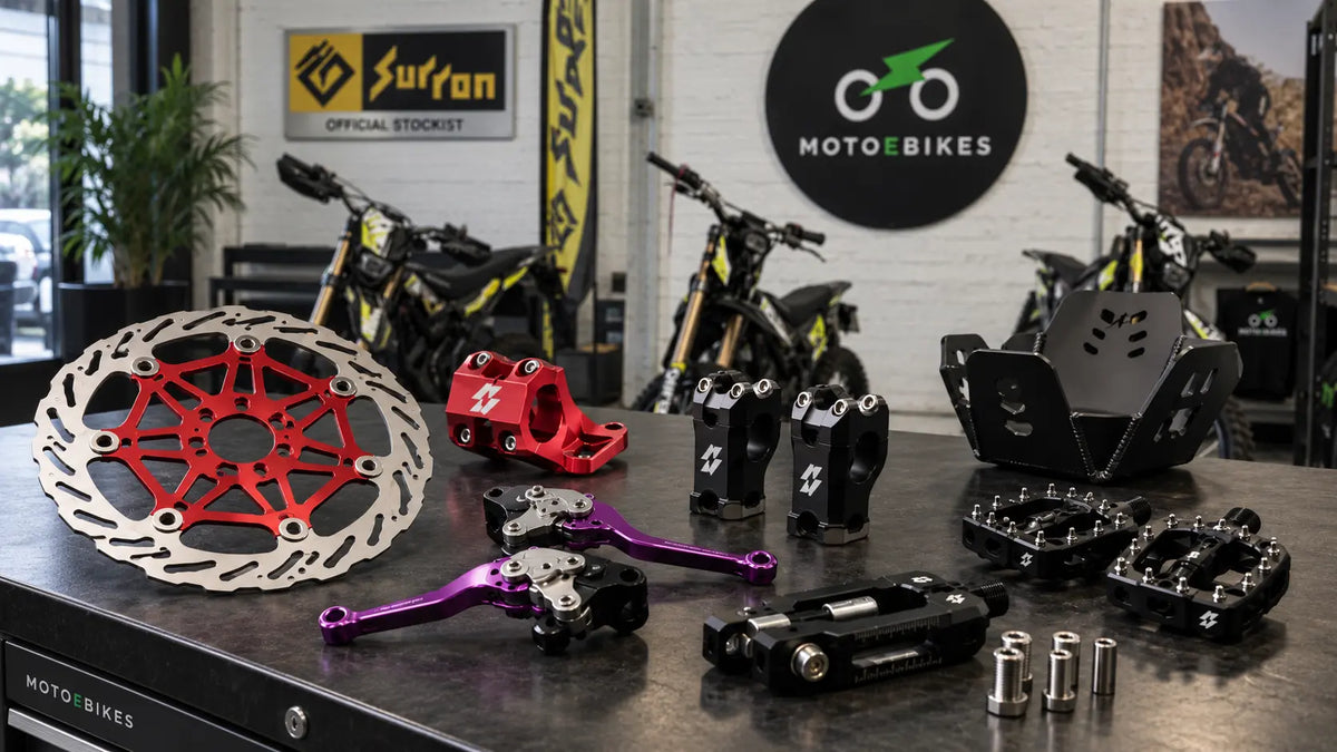 Electric motorbike parts and accessories displayed at the MotoEbikes showroom in Guildford