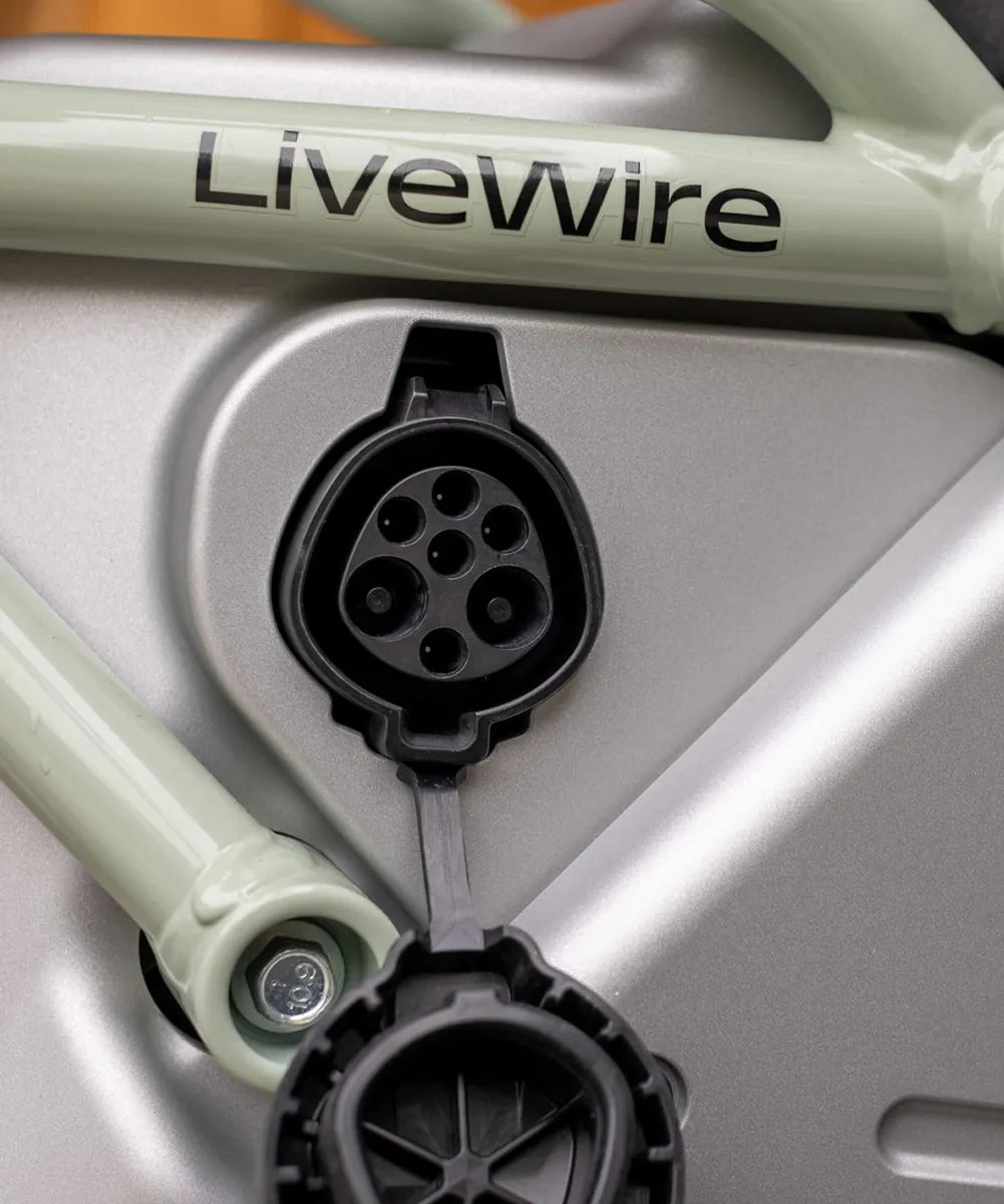 Close-up of the LiveWire S4 Honcho Street charging port in the side of the battery enclosure