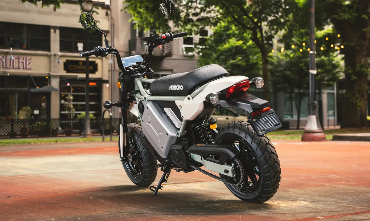 LiveWire S4 Honcho Street parked in an urban square, viewed from the rear three-quarter angle