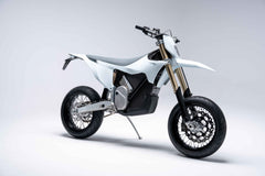 White electric motorcycle on a gray background STARK VARG SM 60HP | Road Legal Electric Supermoto | MotoEBikes